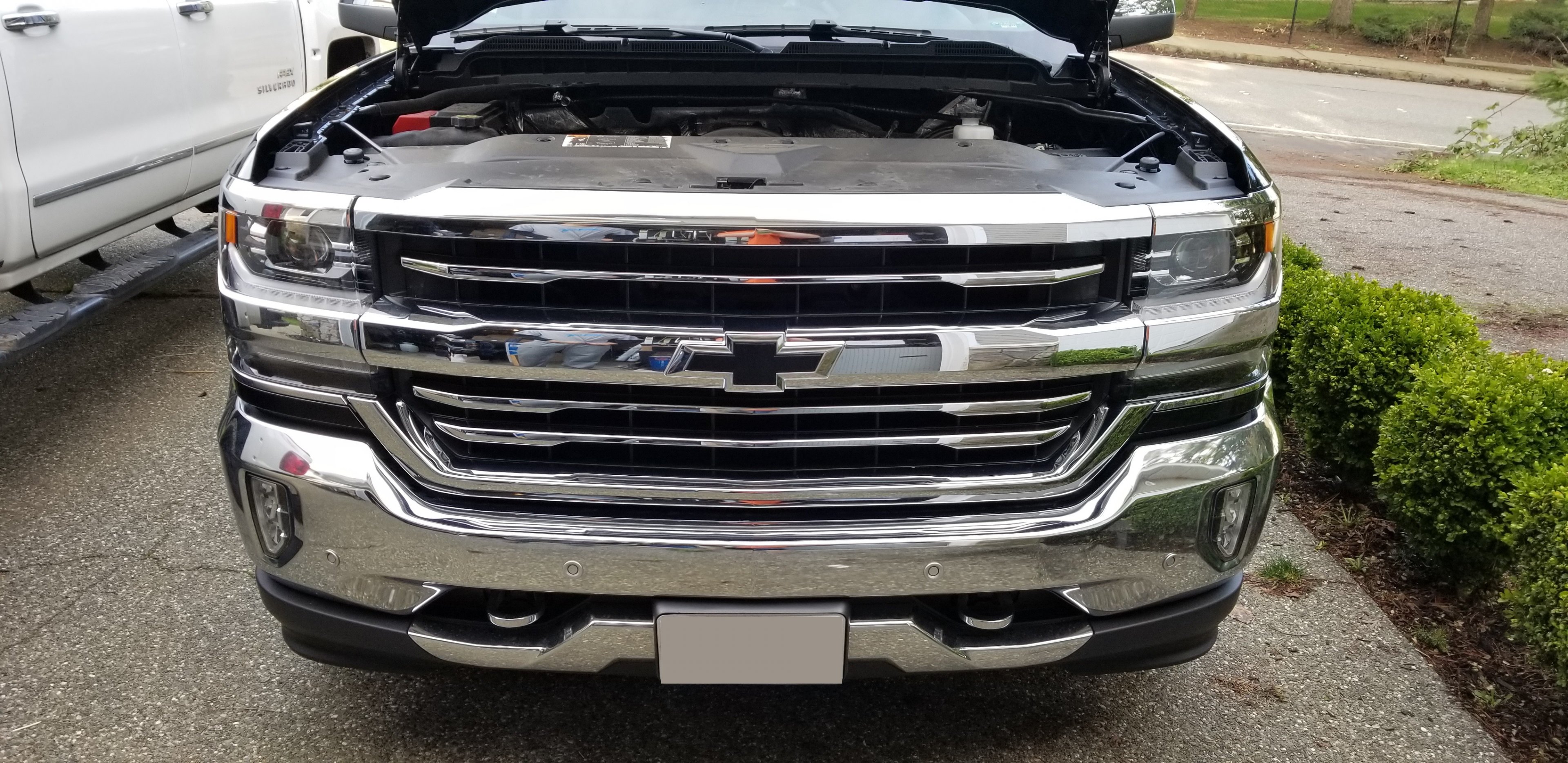 OEM High Country Grille replacing stock OEM LTZ Grille Fullsize Light