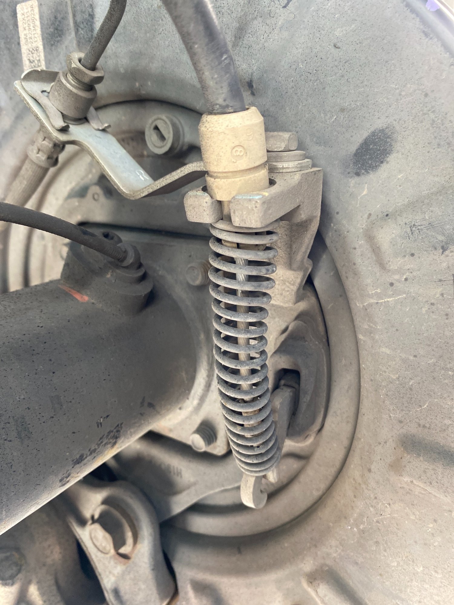 How to disconnect left rear parking brake cable? 20142018 Silverado