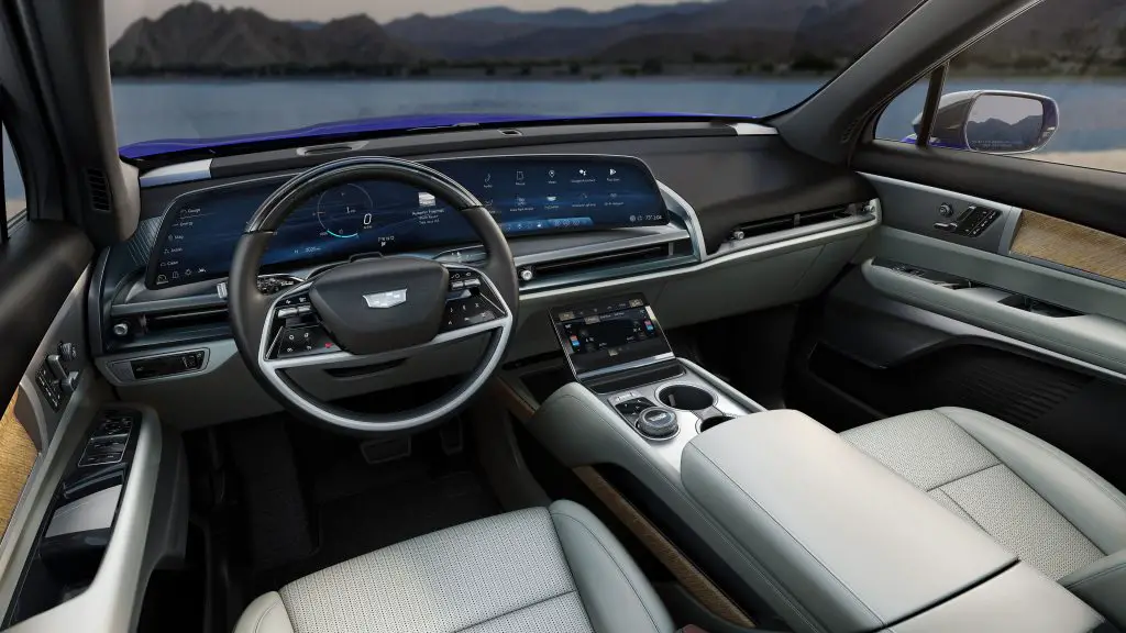 Interior view of the 2026 Cadillac Vistiq EV showing the driver’s seat, steering wheel, and 33-inch LED dashboard display.